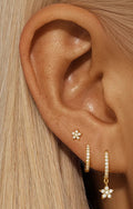 925 Sterling Silver Gold Plated Flower Star Earrings Set with Zirconia worn on model ear