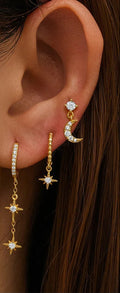925 Sterling Silver Celestial Star Moon Earrings Set worn on model ear